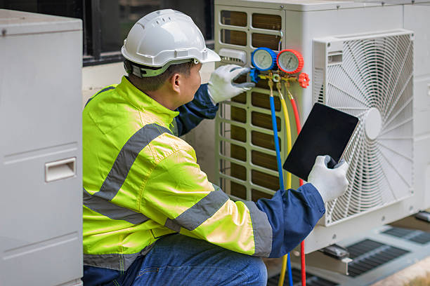 Professional Heat Pump Repair technician working in Arcola, IL